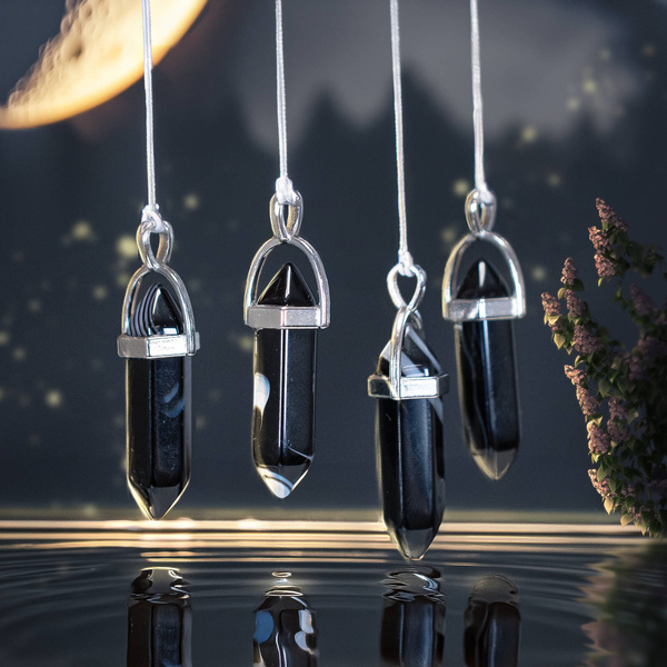 Fekete achát medál tasakban + lánc